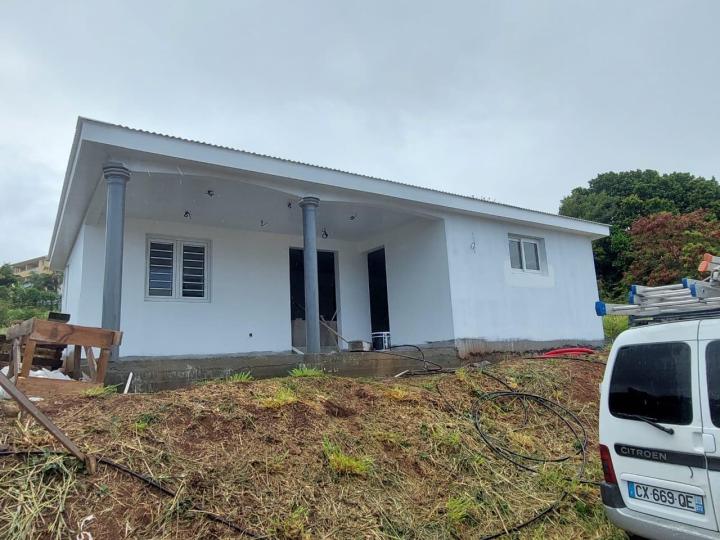 Service de construction de maisons clé en main.